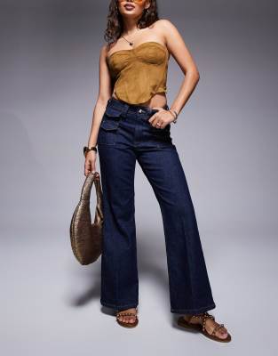 River Island Petite relaxed flare jean in darkwash blue