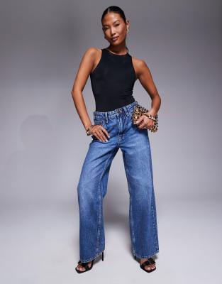 relaxed straight leg jeans in midwash blue