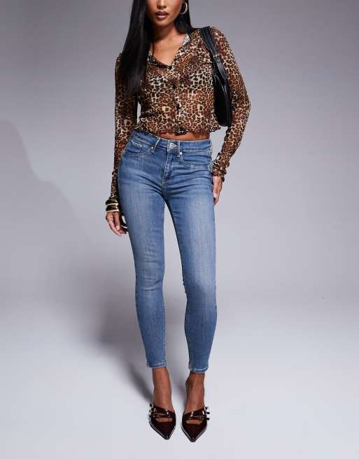 River Island Petite skinny jeans in midwash blue