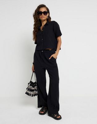 River Island Petite Textured trousers in black