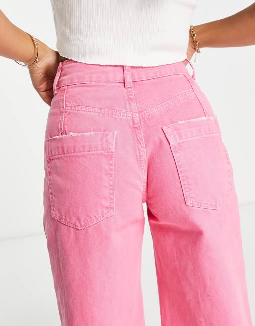 River Island Petite ultra flare jeans in bright pink