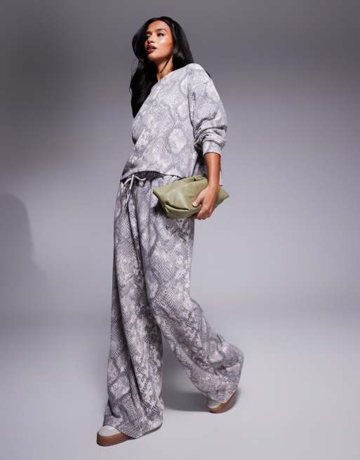 River Island Petite wide leg trackies in snake print (part of a set)