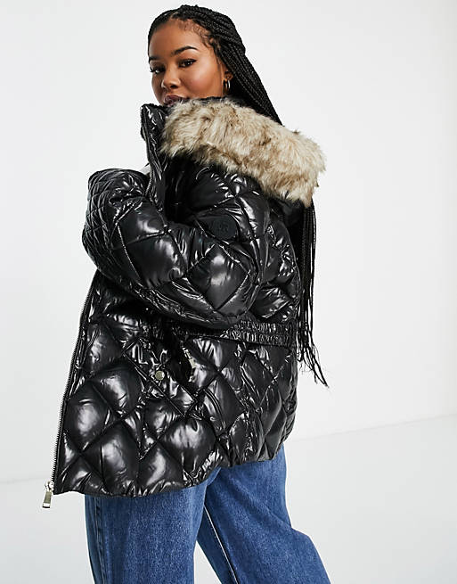 Coats & Jackets River Island Plus belted patent quilted padded jacket with faux fur hood in black 