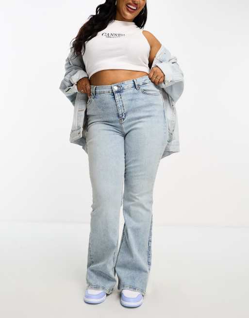 River Island Plus high rise flare jeans in medium blue