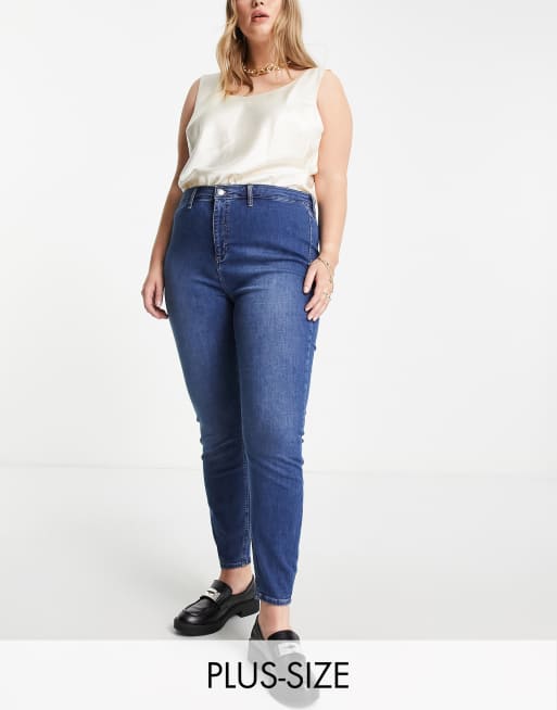 River Island Plus – Kaia – Eng geschnittene Jeans mit hohem Bund in Mittelblau