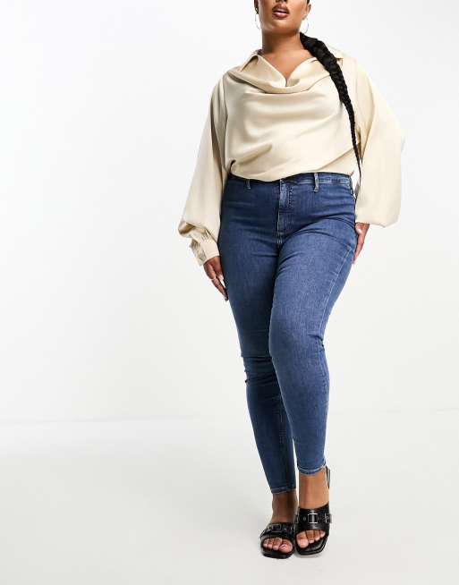 River Island Plus – Mellanblå jegging med hög midja