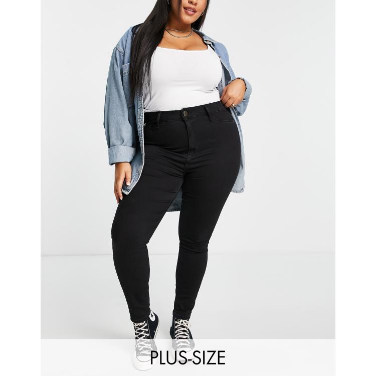 River Island Plus mid rise skinny jeans in black