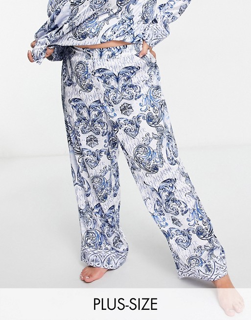River Island Plus paisley printed satin pyjama co-ord trousers in blue