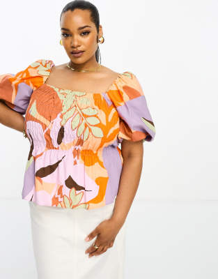 puff sleeve shirred waist peplum top in orange floral