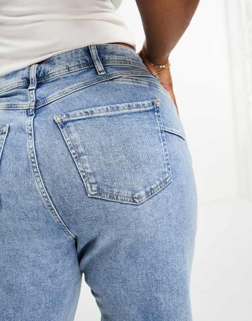 River Island Plus ripped mom jeans in mid blue wash ASOS