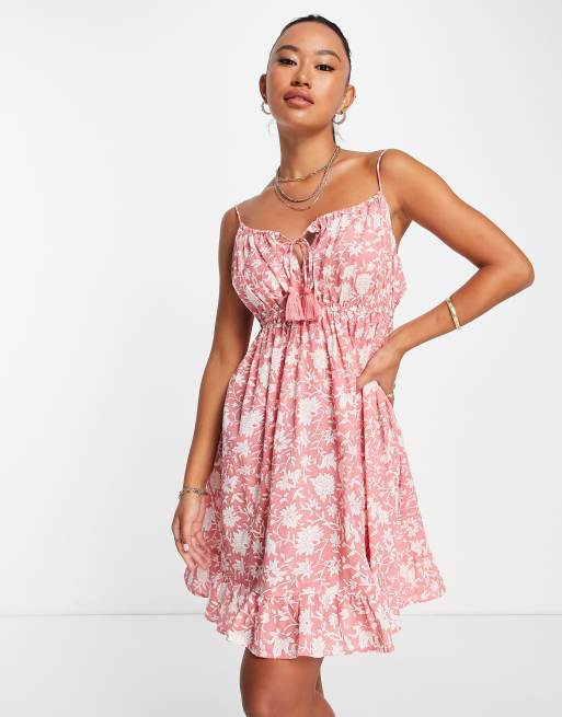 River Island Plus – Rosa mönstrad miniklänning i bomull