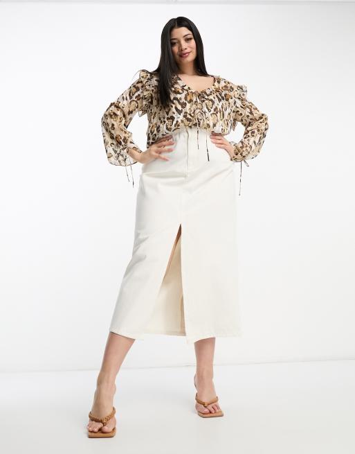 River Island Plus ruffle detail blouse in leopard print ASOS