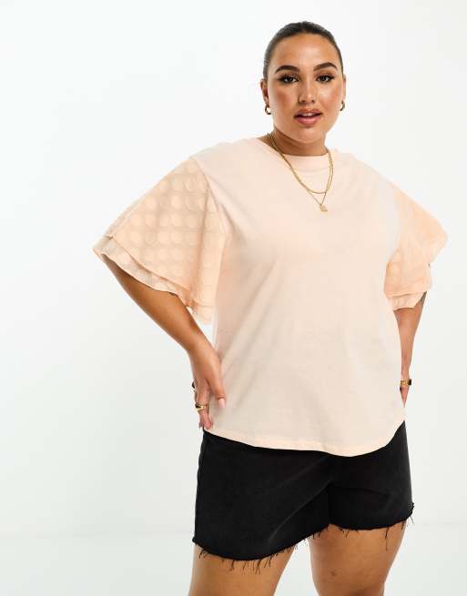 River Island Plus textured frill sleeve top in coral