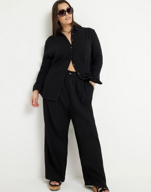 River Island Plus Textured wide leg trousers in black