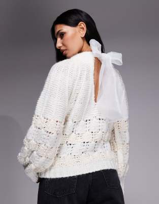 River Island - Pointelle-Pullover in Weiß mit Schleife am Rücken
