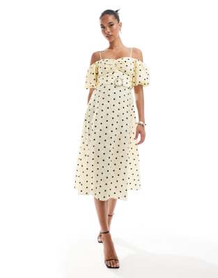 River Island polka dot puff sleeve midi dress in yellow