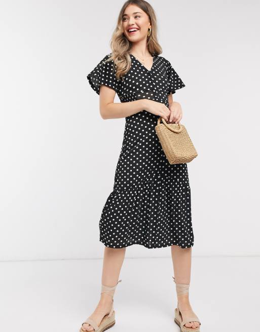 River Island polka dot tiered midi dress in black | ASOS