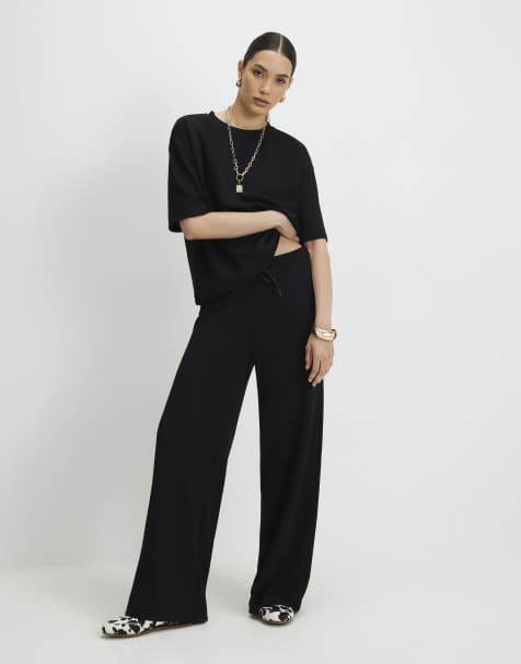 River Island Premium wide leg joggers in black - view 1