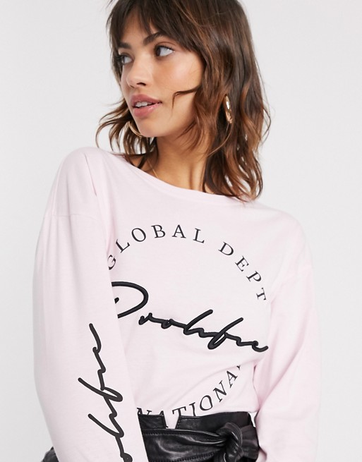 River Island prolific slogan long sleeve t-shirt in pink