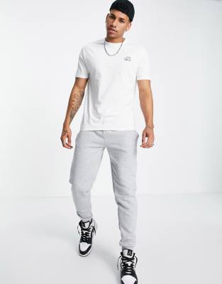 white t shirt grey sweatpants