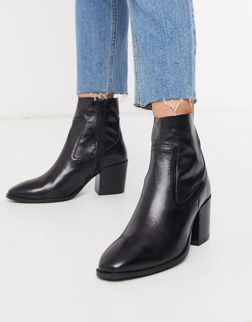 River Island pull on heeled boot in black | ASOS