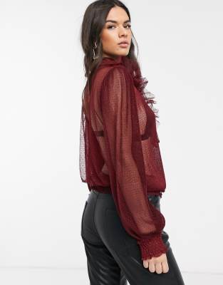 red sheer blouse