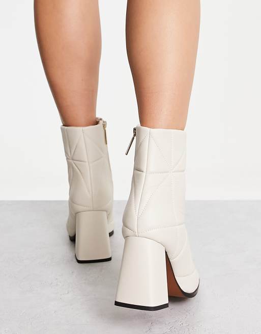 River Island quilted block heel boots in cream ASOS