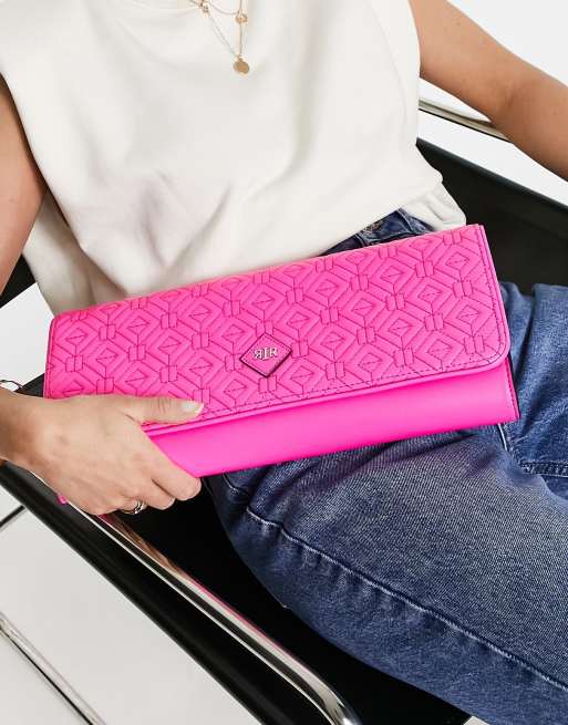 Large pink store clutch bag