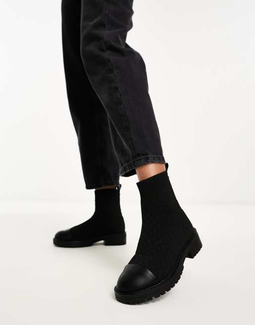 Black flat outlet sock boots