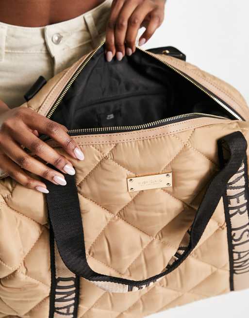 River Island quilted weekend bag in beige | ASOS