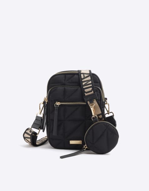 River Island Quilted zip pocket cross body bag in black - view 1