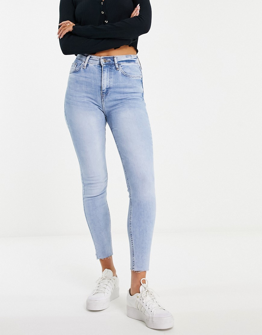 River Island raw hem high waisted skinny jeans in mid blue