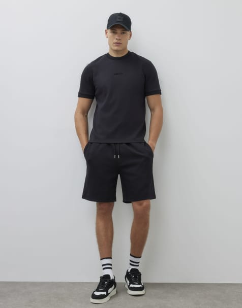 River Island Regular fit drawstring jersey shorts in black - view 1