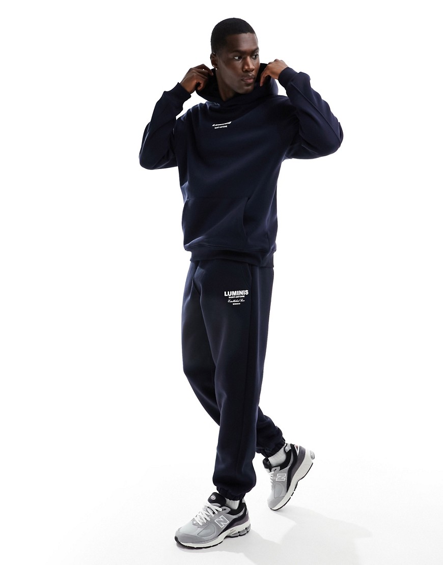 River Island Regular fit printed joggers in navy
