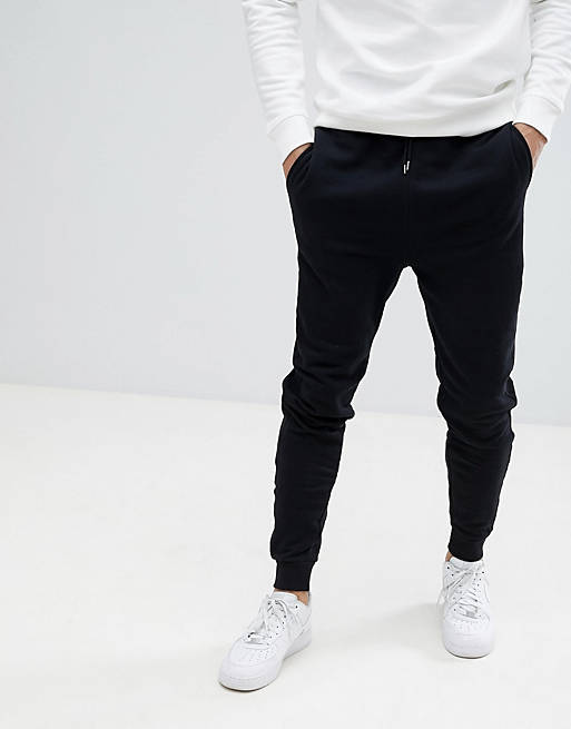 River Island relaxed fit joggers in black | ASOS