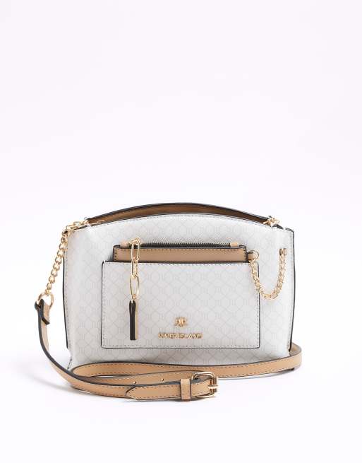 River Island Ri monogram pocket cross body bag in white | ASOS