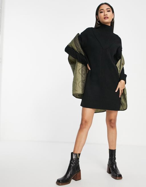 River Island - Robe pull à carreaux avec col montant - Noir
