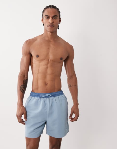 River Island rubber badge detail swim shorts in light blue - view 1