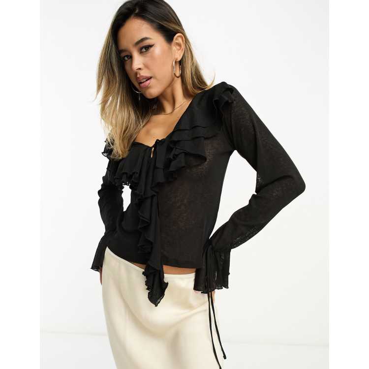 Ruffle store black top