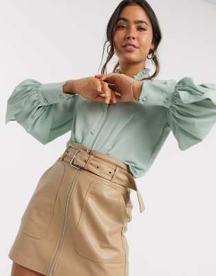 green ruffle blouse