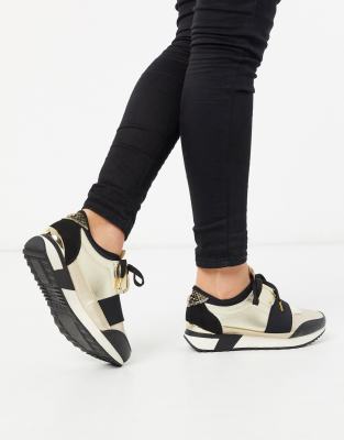 river island gold trainers