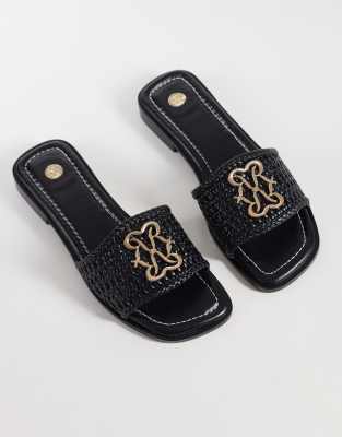 River Island - Sandales mules tressées à logo - Noir