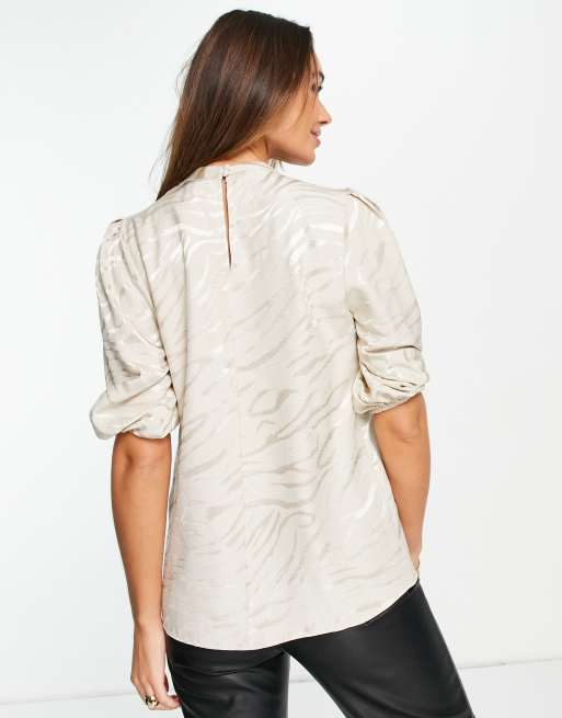 River Island satin high neck gathered blouse in stone | ASOS