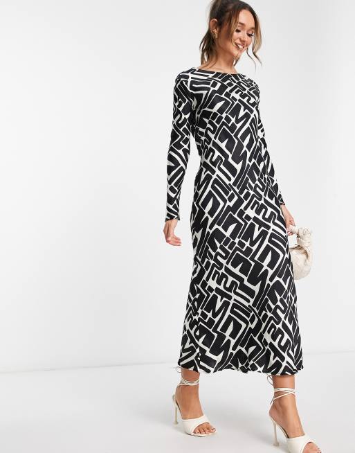 River island black store and white dress