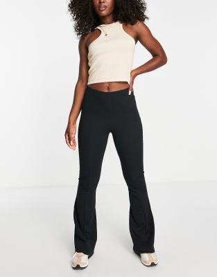 River Island – Schlaghose in schwarzer Neopren-Optik