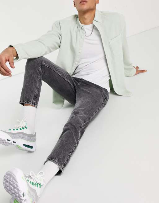 River Island – Schmal zulaufende Jeans in verwaschenem Schwarz