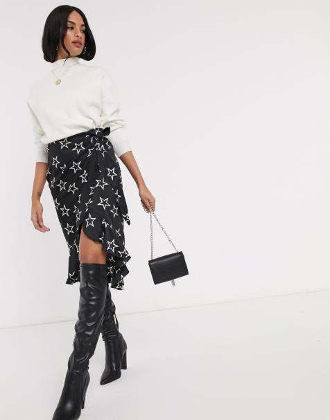 River Island – Schwarzer Midirock mit Sternenmuster