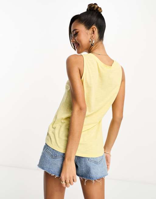 Pale yellow shop tank top