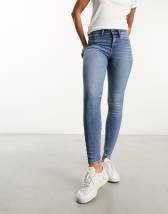 River Island Molly mid rise reform skinny jeans in black