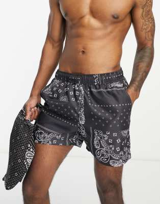 River Island - Short de bain d'ensemble à motif cachemire - Noir 